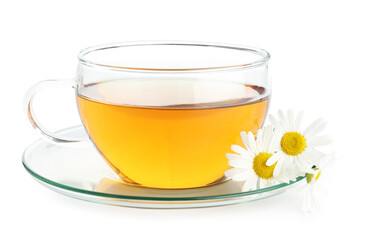 Aromatic tea in glass cup and chamomile flowers isolated on white