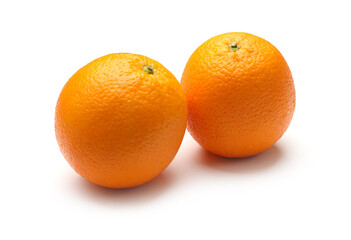 Two whole oranges isolated on white. Citrus fruit