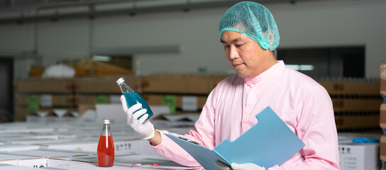 Factory of food or beverages, quality control check juice and water bottle, food or beverages on...