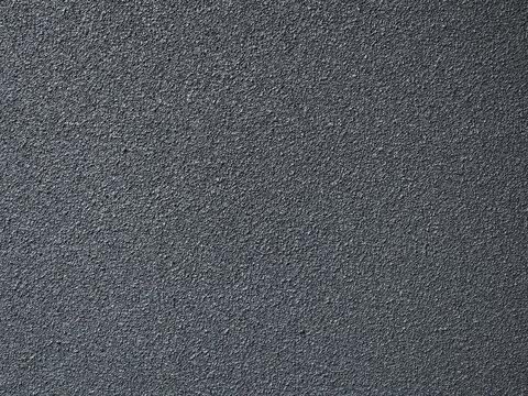 textured gray wall surface with rough finish, ideal for backgrounds or design elements. subtle variations in tone add depth and interest to image