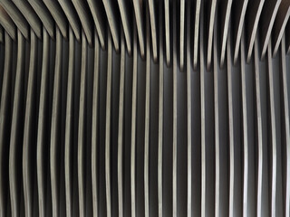 Modern architectural design features curved lines and layered patterns, creating visually striking...