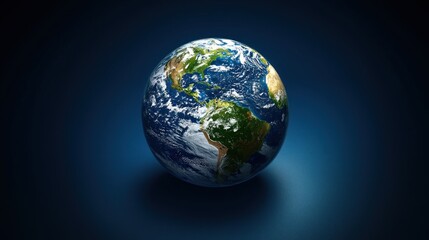 Fototapeta premium A globe with Earth's continents and oceans against a dark blue background.