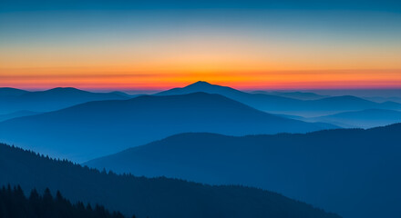 Obraz premium Serene Blue Mountain Range at Colorful Sunrise Landscape Scenery