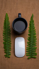 Black coffee mug white computer mouse green fern leaves