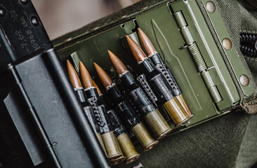 Close-up view of linked rifle ammunition, 5.56mm caliber