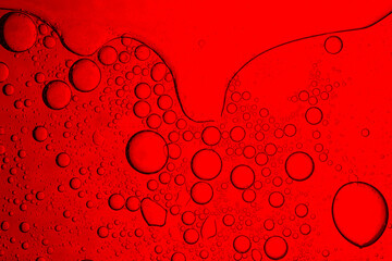 Red drink bubbles macro,Slice of grapefruit in sparkling water. Grapefruit slice covered by bubbles...