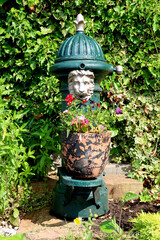 Obsolete Old Disused Drinking Fountain in an Overgrown Village Location