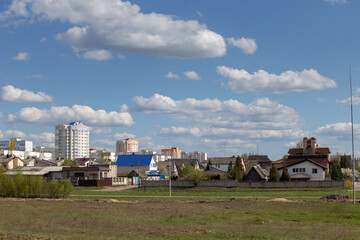 A small town under a bright blue sky, a beautiful city