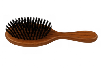 Wooden oval hairbrush featuring black bristles, highlighting professional grooming and personal care styling essentials