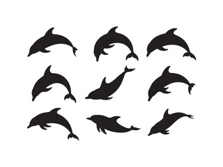 Naklejka premium Collection of dolphin silhouettes vector isolated on white background