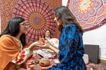 Women sharing organic cocoa in spiritual ceremony