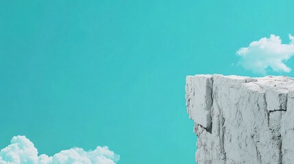 Light gray cliff edge against vibrant teal sky