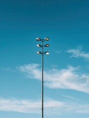 Pole lighting against sky