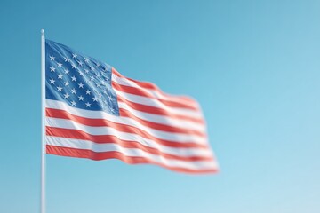 Fototapeta premium american flag gently waving in wind on clear blue sky with ample copy space embodying solemn remembrance on patriot