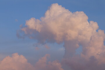 Skyward Whispers: Capturing the ethereal dance of clouds in a cerulean expanse, a serene moment of...