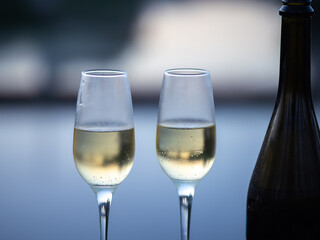 Two glasses of cold champagne outdoors