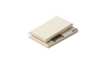 Light beige books stacked and arranged.