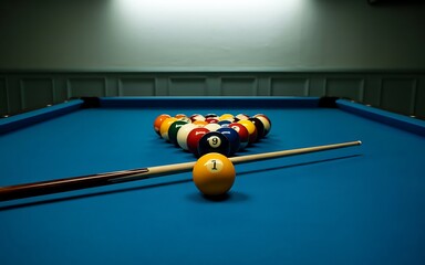 A racked triangle of colorful billiard balls sits on a vibrant blue pool table with a cue stick positioned in the foreground ready for play