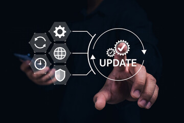 A person interacts with a virtual interface displaying an "UPDATE" button surrounded by technology and security icons on a dark background.