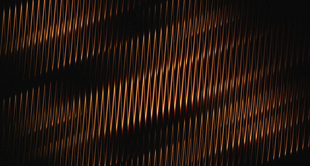 Dark orange and yellow and black abstract background, grainy texture, glowing red gradient light effect, modern wallpaper, digital backdrop, horizontal banner layout

