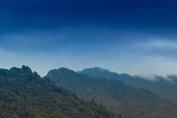 Scenic beauty of layers of mountains, Okhrey, sikkim, India. Okhrey village of one of the remotest places in Sikkim where peaceful, tranquil Himalayan mountain range is enjoyed by tourists from India.