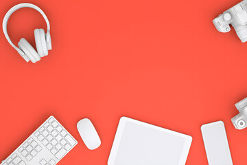 Modern Workspace with White Tech Gadgets on Bold Red Surface for Creative and Productive Office Setup