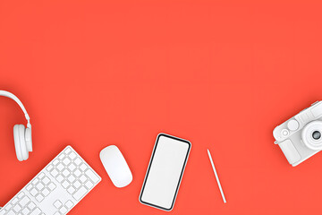 Essential Modern Workspace Tech Setup on Vibrant Coral Background Featuring Gadgets and Productivity Tools