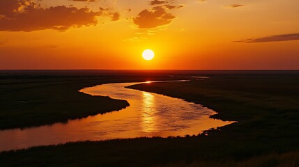 Naklejka premium Sunset over a river in the steppe. Summer landscape.