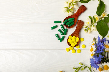 Alternative medicine herbal capsule organic drug on wooden background.Assortment of herbal and tablets,vitamins and dietary supplements.medicinal and Healing herbs.natural supplements for healthy life