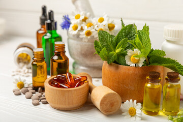 Alternative medicine herbal capsule organic drug on wooden background.Assortment of herbal and tablets,vitamins and dietary supplements.medicinal and Healing herbs.natural supplements for healthy life