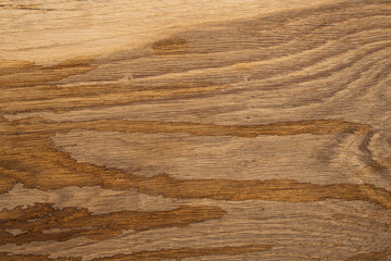 Liquid pouring stains on oak wood texture, cleaning natural wood furniture