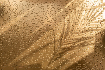 Empty golden jigsaw puzzle with sun rays and palm leaf shadows, abstract cosmetic backdrop for product placement