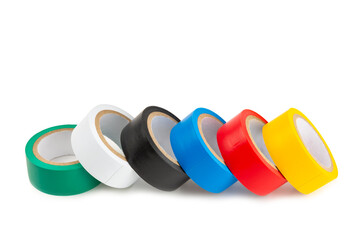 Insulating tape on a bright colored background. Set of different colors insulating tape. Reel...