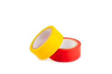 Insulating tape on a bright colored background. Set of different colors insulating tape. Reel...