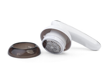 Electrical machine for removing pellet on a white background. Restoration of old clothes.