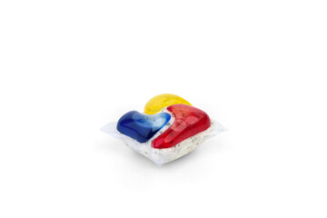 Color dishwasher safe capsules isolated on white background.
