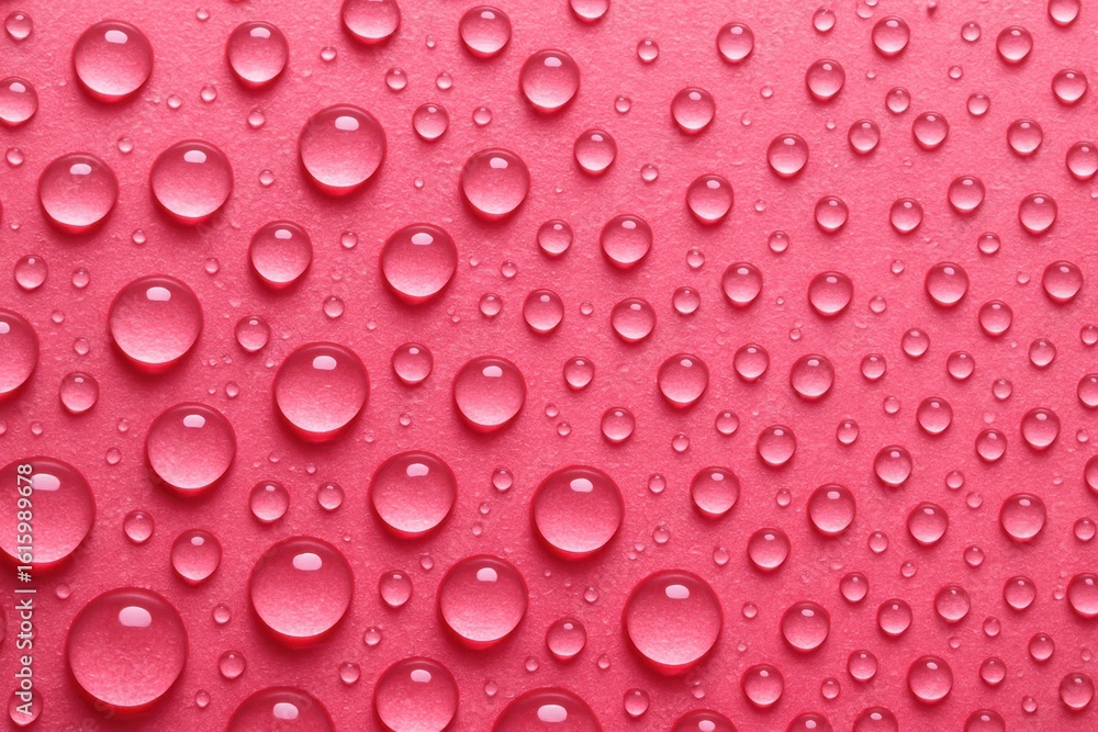 Poster a sea of pink droplets on a textured backdrop, creating an abstract pattern that captures the essenc