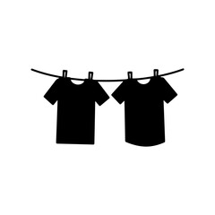 T shirt hanging on rope silhouette icon vector flat design.