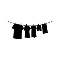 Clothing hanging on rope silhouette icon vector flat design.