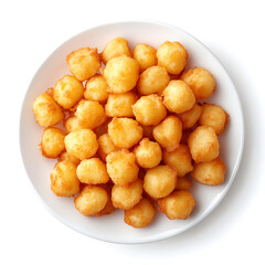 Golden, crispy tater tots piled on a white plate