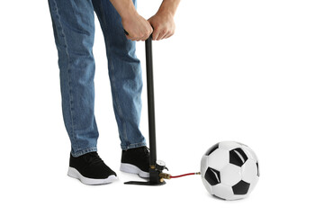 Man inflating soccer ball with manual air pump on white background, closeup