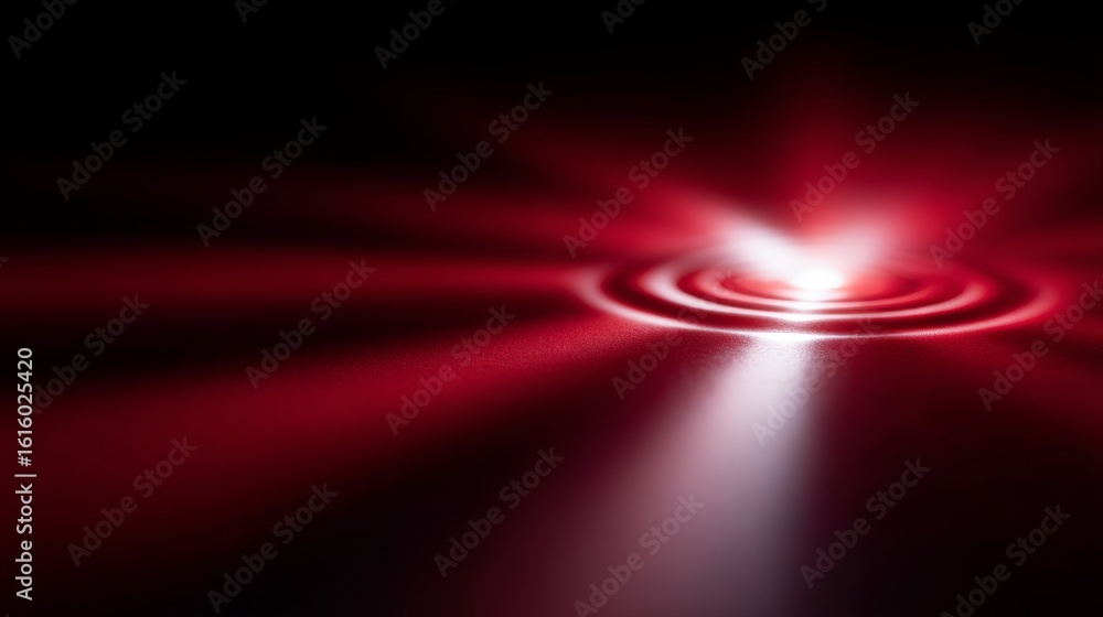 Poster a vibrant burst of red light radiates in circles. the image captures a mesmerizing display of color 