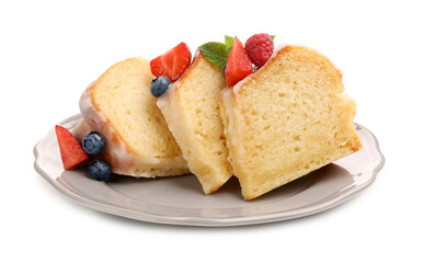 Pieces of delicious bundt cake with berries, glaze and mint isolated on white