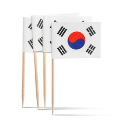 Small paper flags of South Korea on white background