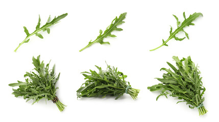 Fresh green arugula on white background, set