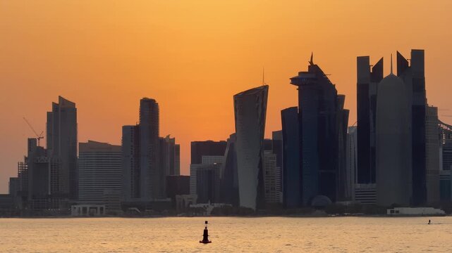 Doha Skyline Silhouette at Sunset from Old Doha Port &ndash; Scenic Waterfront View