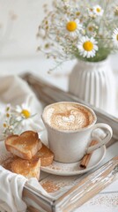 A mug of coffee adorned with latte art sits near heart-shaped toast and daisies on a tray. Cinnamon sticks and a white cloth accent the scene. A serene and cozy start to the day