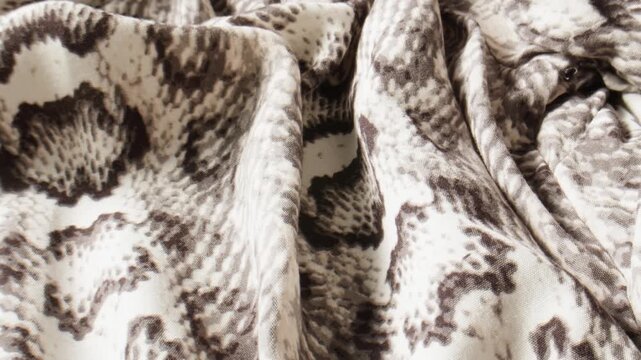 Discover the Elegant Python Print Fabric, perfect for your Fashion and Design Creations