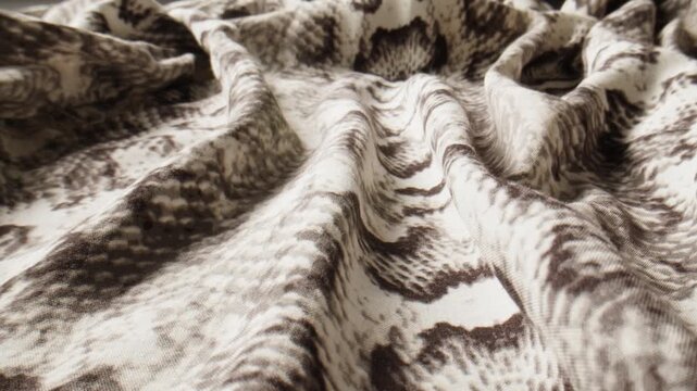 Discover the Elegant Python Print Fabric, perfect for your Fashion and Design Creations