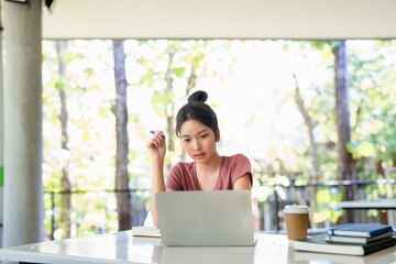Education, writing notes and girl in college for knowledge, assignment project or learning. Book,...